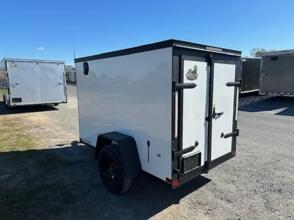 2025-5X8-COVERED-WAGON-ENCLOSED-CARGO-TRAILER-BARN-DOORS-BLACK-TRIM-2.webp Covered Wagon 5 x 8 Enclosed Cargo Trailer Black Trim