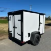 2025-5X8-COVERED-WAGON-ENCLOSED-CARGO-TRAILER-BARN-DOORS-BLACK-TRIM-3.webp Covered Wagon 5 x 8 Enclosed Cargo Trailer Black Trim
