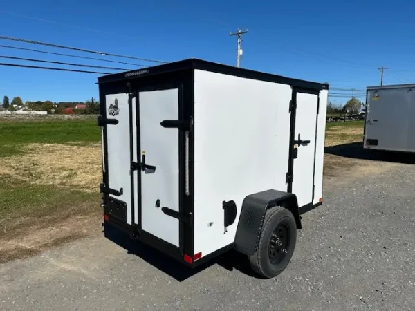 2025-5X8-COVERED-WAGON-ENCLOSED-CARGO-TRAILER-BARN-DOORS-BLACK-TRIM-3.webp Covered Wagon 5 x 8 Enclosed Cargo Trailer Black Trim