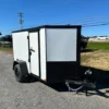 2025-5X8-COVERED-WAGON-ENCLOSED-CARGO-TRAILER-BARN-DOORS-BLACK-TRIM-4.webp Covered Wagon 5 x 8 Enclosed Cargo Trailer Black Trim