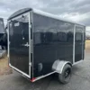 2025-CARRY-ON-ENCLOSED-CARGO-TRAILER-RAMP-DOOR-DING-AND-DENT-1.webp Ding & Dent Carry-On 6 x 12 Enclosed Trailer
