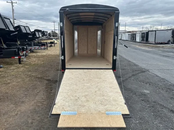 2025-CARRY-ON-ENCLOSED-CARGO-TRAILER-RAMP-DOOR-DING-AND-DENT-6.webp Ding & Dent Carry-On 6 x 12 Enclosed Trailer
