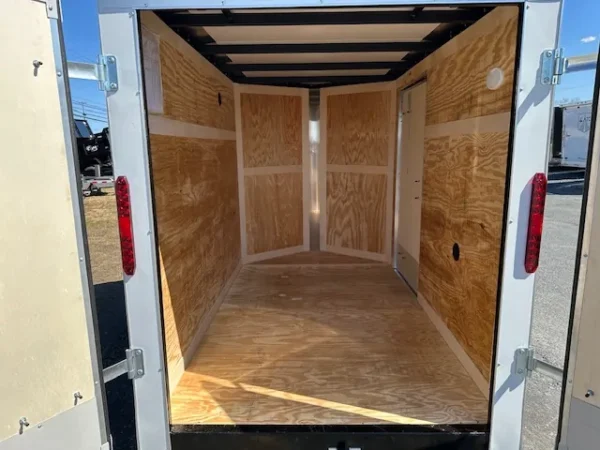 2025-HOMESTEADER-5X8-ENCLOSED-CARGO-TRAILER-BARN-DOORS-6-1.webp Homesteader 5 x 8 Enclosed V-Nose Cargo Trailer