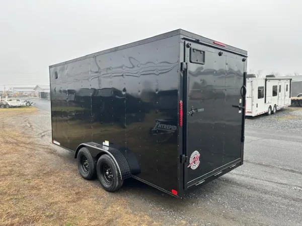 2025-HOMESTEADER-ENCLOSED-CARGO-TRAILER-RAMP-DOOR-ADDED-HEIGHT-BLACK-TRIM-1.webp Homesteader 7 x 16 V-Nose Enclosed Cargo Trailer