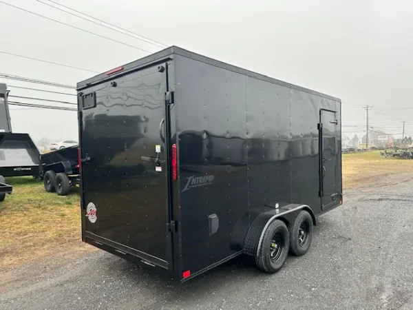2025-HOMESTEADER-ENCLOSED-CARGO-TRAILER-RAMP-DOOR-ADDED-HEIGHT-BLACK-TRIM-2.webp Homesteader 7 x 16 V-Nose Enclosed Cargo Trailer