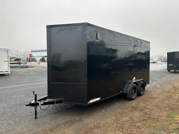 2025-HOMESTEADER-ENCLOSED-CARGO-TRAILER-RAMP-DOOR-ADDED-HEIGHT-BLACK-TRIM-4.webp Homesteader 7 x 16 V-Nose Enclosed Cargo Trailer