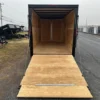2025-HOMESTEADER-ENCLOSED-CARGO-TRAILER-RAMP-DOOR-ADDED-HEIGHT-BLACK-TRIM-5.webp Homesteader 7 x 16 V-Nose Enclosed Cargo Trailer