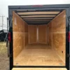2025-HOMESTEADER-ENCLOSED-CARGO-TRAILER-RAMP-DOOR-ADDED-HEIGHT-BLACK-TRIM-6.webp Homesteader 7 x 16 V-Nose Enclosed Cargo Trailer