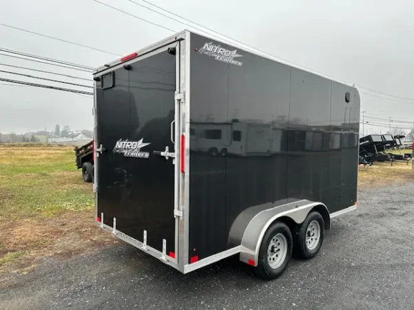 2025-NITRO-ELEVATION-7X14-ENCLOSED-CARGO-TRAILER-RAMP-DOOR-SIDE-DOOR-1.webp Nitro 7×14 Enclosed Cargo Trailer