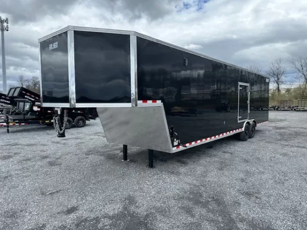 Car-Mate-8.5-x-38-Gooseneck-Enclosed-Cargo-Trailer-Rear-Ramp-Door-Car-Hauler-Get-Out-Door-Aluminum-Wheels-3.webp Car Mate 8.5 x 38 Enclosed Gooseneck Trailer Aluminum Wheels