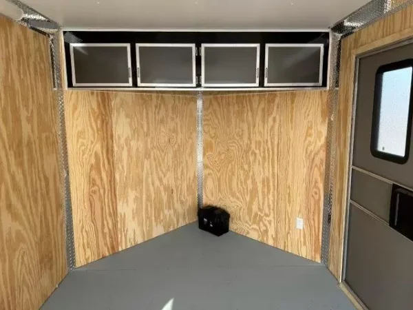 Car-Mate-8.5x16-V-Nose-Enclosed-Cargo-Trailer-Light-Package-Cabinets-AC-Unit-2.webp Car Mate 8.5 x 16 Enclosed V-Nose Cargo Trailer A/C Unit
