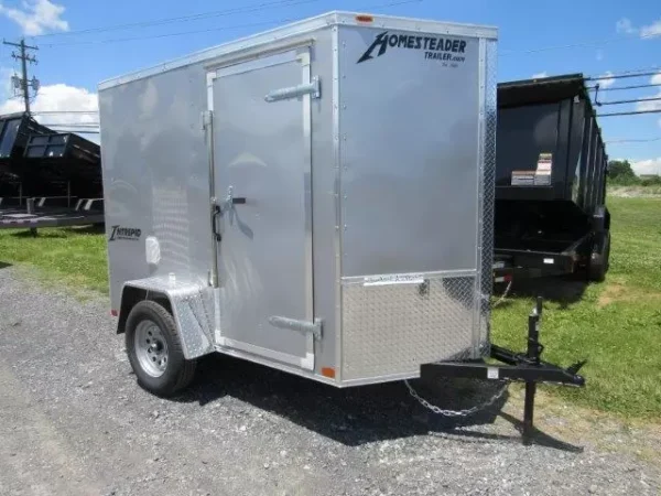Homesteader-5x8-V-Nose-Ramp-Door-Side-Door-6-Interior-Height-1-1.webp Homesteader 5 x 8 Enclosed V-Nose Cargo Trailer