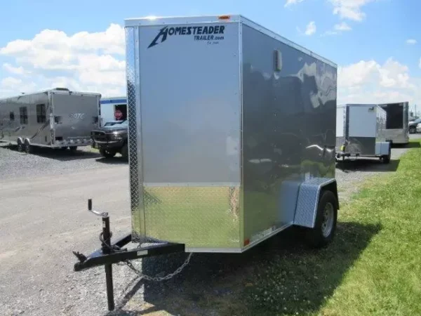 Homesteader-5x8-V-Nose-Ramp-Door-Side-Door-6-Interior-Height-2-1.webp Homesteader 5 x 8 Enclosed V-Nose Cargo Trailer