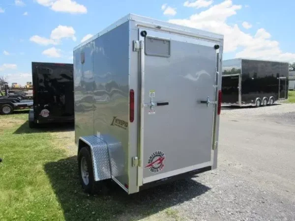 Homesteader-5x8-V-Nose-Ramp-Door-Side-Door-6-Interior-Height-3-1.webp Homesteader 5 x 8 Enclosed V-Nose Cargo Trailer