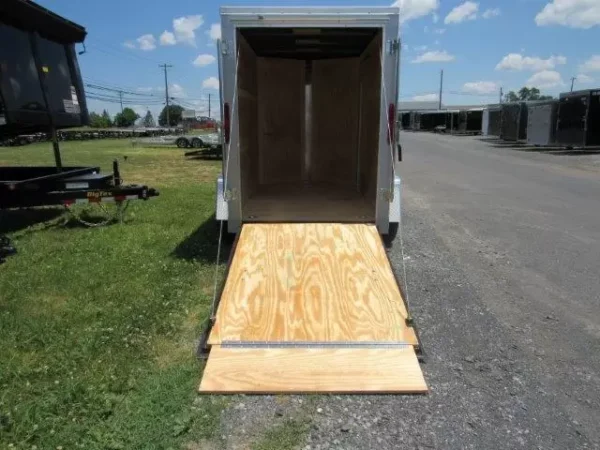Homesteader-5x8-V-Nose-Ramp-Door-Side-Door-6-Interior-Height-5-1.webp Homesteader 5 x 8 Enclosed V-Nose Cargo Trailer