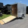 Homesteader-5x8-V-Nose-Ramp-Door-Side-Door-6-Interior-Height-6-1.webp Homesteader 5 x 8 Enclosed V-Nose Cargo Trailer