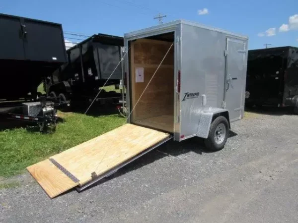 Homesteader-5x8-V-Nose-Ramp-Door-Side-Door-6-Interior-Height-6-1.webp Homesteader 5 x 8 Enclosed V-Nose Cargo Trailer